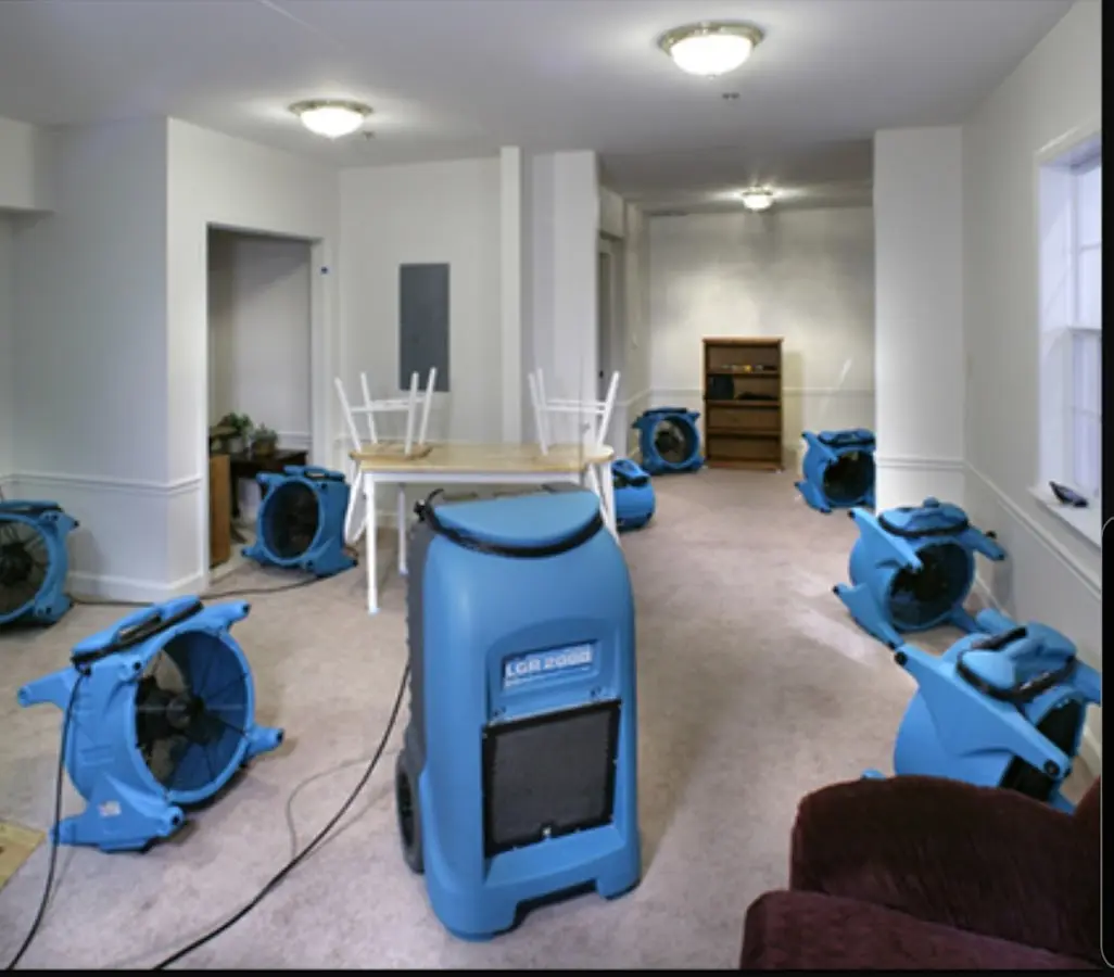 Air movers and dehumidifier setup for Water Extraction & Removal in Centerton