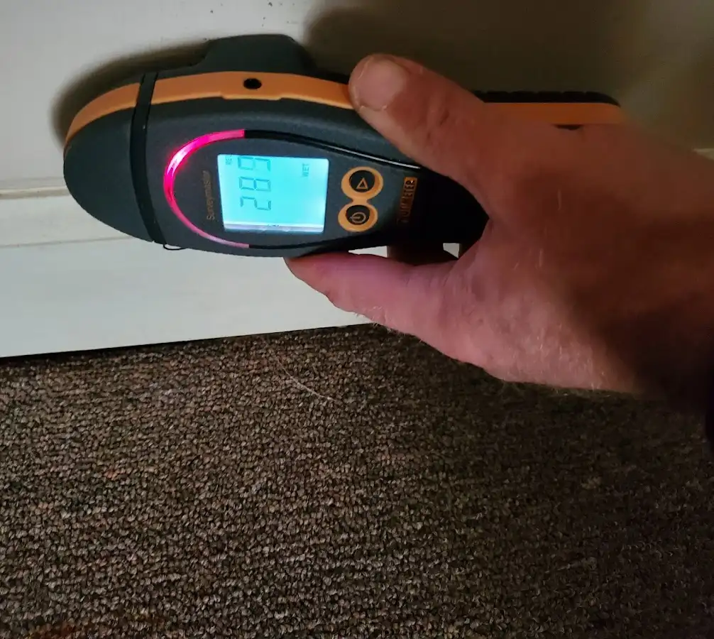 Moisture detection at baseboard during Burst Pipe Cleanup in Centerton